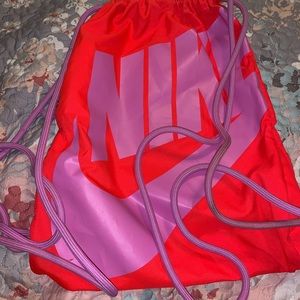 Nike drawstring bag orange and purple